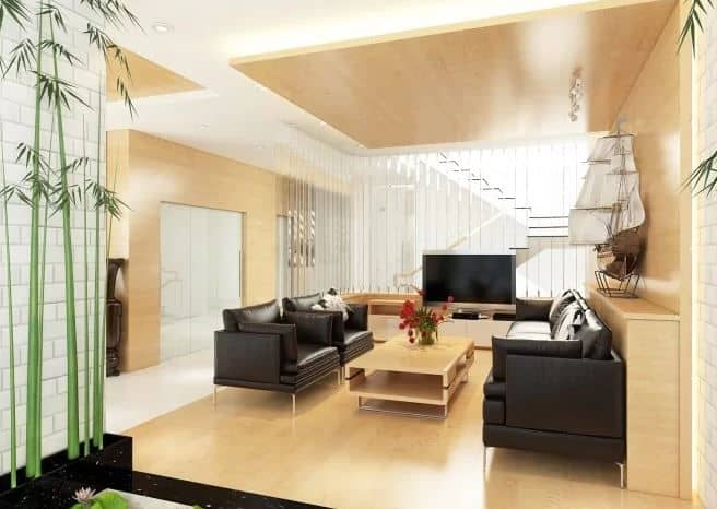 Tông màu gỗ kết hợp sofa chất liệu giả da màu đen theo phong cách hiện đại. Tông màu gỗ kết hợp sofa chất liệu giả da màu đen theo phong cách hiện đại.